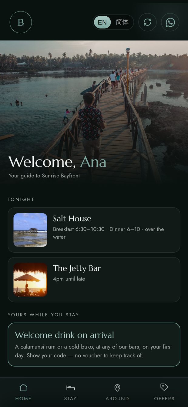 The guest app open on a phone: a photograph of the hotel, a greeting, tonight’s dining and an offer, with Home, Stay, Around and Offers along the bottom.