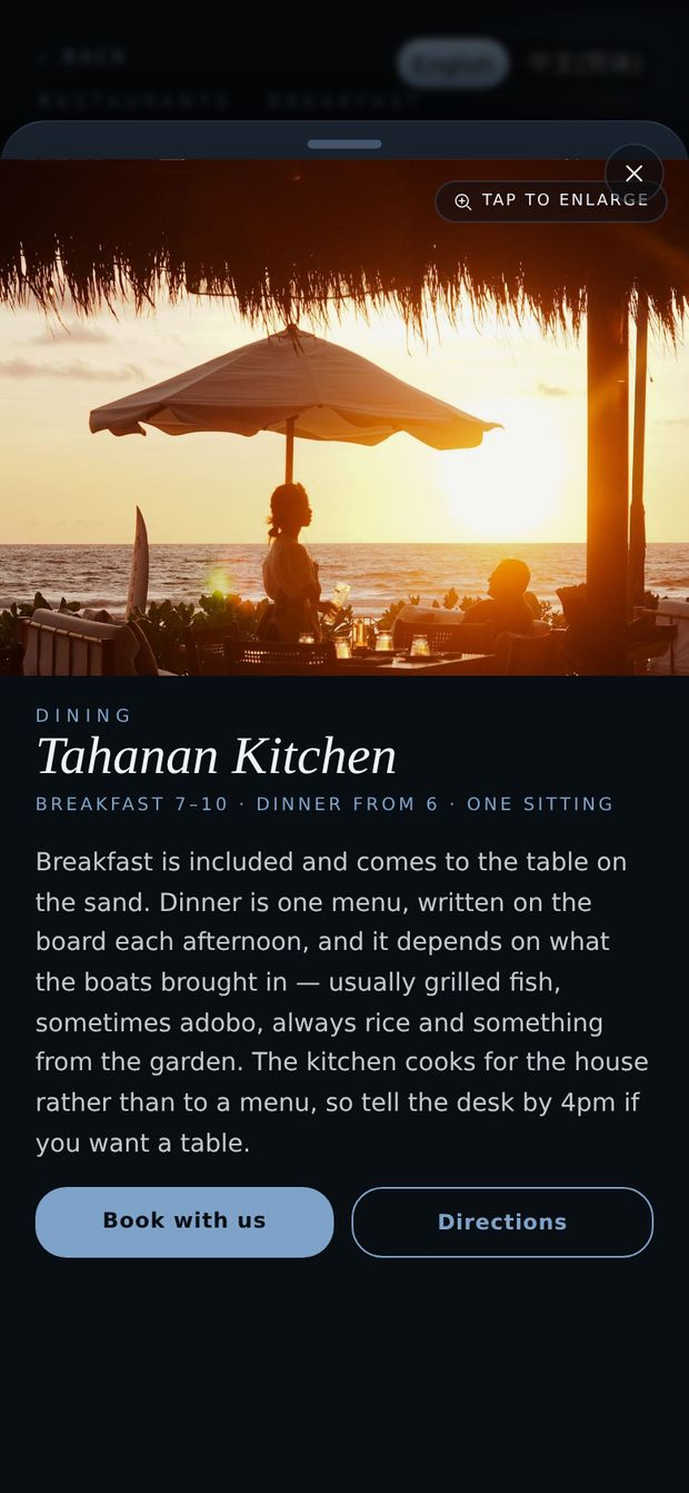 The hotel’s own kitchen open in the app: a photograph, the opening times, a full description and a Book with us button.