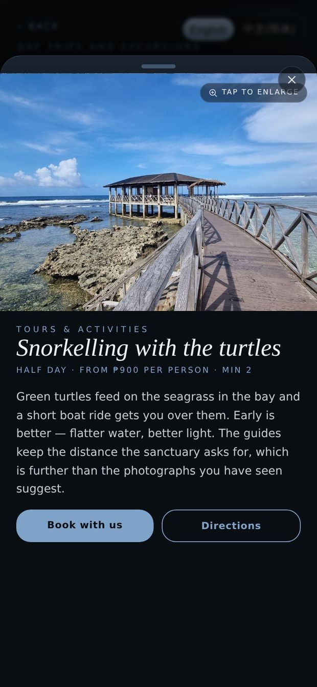A snorkelling trip open in the guest app under Tours and activities, with the price, the full description, and a Book with us button.