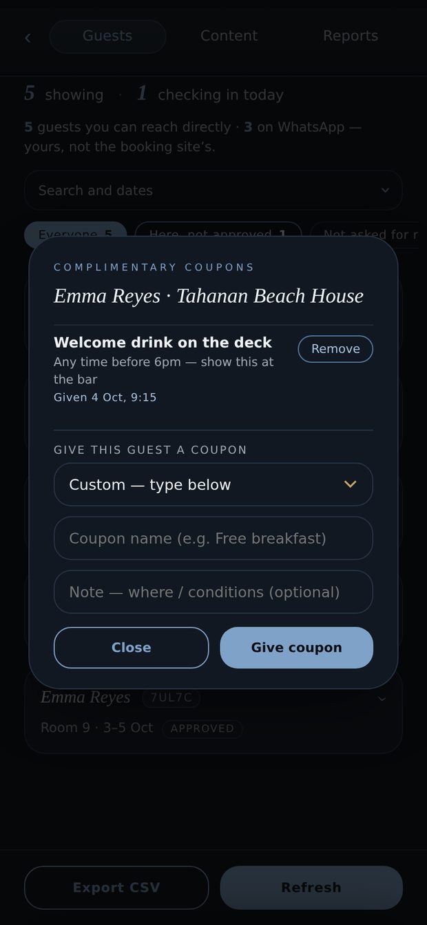 The owner’s console on a phone, with a dialog open over the guest list headed Complimentary coupons for Emma Reyes at Tahanan Beach House — her own card, reading Room 9, is visible behind it. The dialog shows a coupon she has already been given: a welcome drink on the deck, any time before 6pm, show this at the bar, given 4 October at 9:15, with a Remove button. Underneath is a form to give this one guest another — a dropdown of the hotel’s own perks, a coupon name, an optional note, and a Give coupon button.